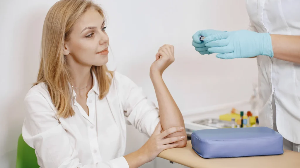 A Girl getting her blood checked